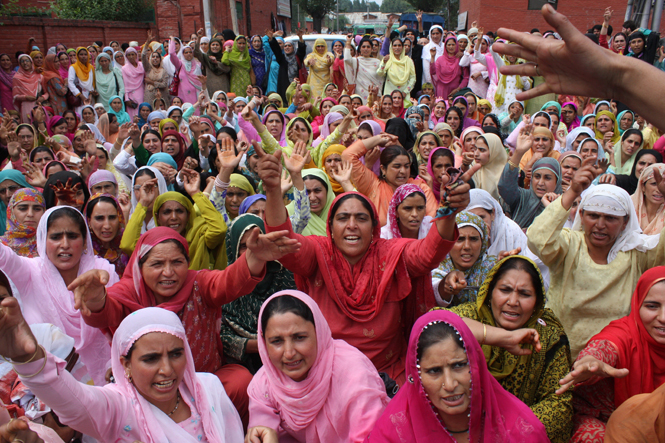 Women protesting in the Press Enclave, Lal Chowk, Srinagar, against the double rape and murder of our beloved sisters from Shopian, Shaheed Aasiya and Shaheed Nilofar, by the Indian Occupation. 2009. Photo credit Bilal Bahadur — in Srinagar, India.